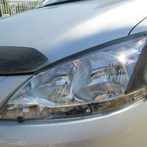 Headlight Guards (3D Carbon Fibre Look) - Nissan Sentra 2013–2014