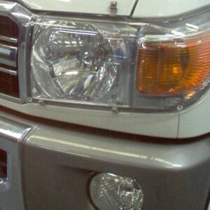 Headlight Guards (Clear) - Toyota L/Cruiser Pick up 70 & 79 Series 2006 - 2024